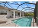 Stunning screened-in pool and patio area offering a private oasis for relaxation and outdoor entertainment at 3508 Anchor Bay Trl, Lakewood Ranch, FL 34211