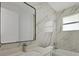 Stylish bathroom showcasing marble tile, a modern vanity, and bathtub/shower combo at 3694 Crittendon St, North Port, FL 34286