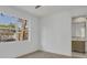 Bright bedroom with a large window and an ensuite bathroom with marble details at 3694 Crittendon St, North Port, FL 34286