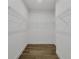 Walk in closet with wire shelving and wood-look tile flooring at 3694 Crittendon St, North Port, FL 34286
