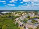 An aerial view showcasing community buildings, lakes, and lush landscaping at 3718 59Th Ave W # 3718, Bradenton, FL 34210