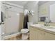 Bathroom with updated vanity, shower and flooring at 3718 59Th Ave W # 3718, Bradenton, FL 34210