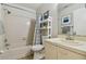 Bathroom with updated vanity, shower and tub combination at 3718 59Th Ave W # 3718, Bradenton, FL 34210