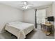 Cozy bedroom with neutral walls, ceiling fan, and natural light at 3718 59Th Ave W # 3718, Bradenton, FL 34210