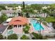 Aerial view of community pool, hot tub, sundeck and clubhouse at 3718 59Th Ave W # 3718, Bradenton, FL 34210