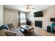 Cozy living room with fireplace and natural light at 3718 59Th Ave W # 3718, Bradenton, FL 34210