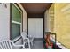 Relaxing covered patio features two chairs at 3718 59Th Ave W # 3718, Bradenton, FL 34210