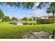 View of community pond and fountain from park bench at 3718 59Th Ave W # 3718, Bradenton, FL 34210