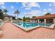 Community pool with lounge chairs and clear skies at 3718 59Th Ave W # 3718, Bradenton, FL 34210