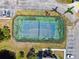 Overhead view of community tennis court with parking at 3718 59Th Ave W # 3718, Bradenton, FL 34210