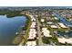 Aerial view of waterfront homes and canals, showing a community with water access at 3859 Catalina Dr, Bradenton, FL 34210