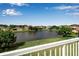 Backyard view of pond and surrounding community from outdoor balcony at 4007 61St E Dr, Bradenton, FL 34203