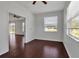 Bedroom featuring a ceiling fan and a sliding glass door at 4007 61St E Dr, Bradenton, FL 34203