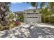 Charming two-story home with a well-manicured front yard and a spacious two-car garage at 4013 Red Rock Ln, Sarasota, FL 34231