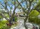 Charming two-story home with well maintained lawn and driveway, complemented by an attached garage at 4013 Red Rock Ln, Sarasota, FL 34231