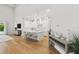 Open-concept living space featuring a bright kitchen, wood floors, and seamless integration of living and dining areas at 4013 Red Rock Ln, Sarasota, FL 34231