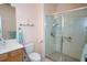 Clean bathroom with glass-enclosed shower, neutral color palette, and vanity with ample counter space at 4069 Overture Cir # 341, Bradenton, FL 34209
