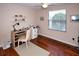 Bedroom office space featuring hardwood floors, natural light, and space to work from home at 4069 Overture Cir # 341, Bradenton, FL 34209