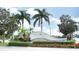 Palma Sola Trace community entrance sign surrounded by lush landscaping and palm trees on a bright day at 4069 Overture Cir # 341, Bradenton, FL 34209