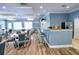 Community room with kitchen area, tables, chairs, bar, lounge area at 4069 Overture Cir # 341, Bradenton, FL 34209