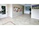 Well-lit lobby with tile flooring and community bulletin boards at 4069 Overture Cir # 341, Bradenton, FL 34209