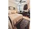Serene bedroom featuring a ceiling fan and a versatile desk area at 4136 Cascade Falls Dr, Sarasota, FL 34243