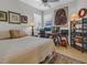 Cozy bedroom featuring a dedicated workspace with a desk, chair, and stylish decor at 4136 Cascade Falls Dr, Sarasota, FL 34243