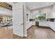Modern kitchen featuring white cabinets, stainless steel appliances, and a sunlit window at 4136 Cascade Falls Dr, Sarasota, FL 34243