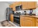 The updated kitchen features stainless steel appliances and beautiful granite countertops at 4136 Cascade Falls Dr, Sarasota, FL 34243