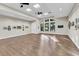 Spacious living room with ample natural light and stylish flooring at 4136 Cascade Falls Dr, Sarasota, FL 34243