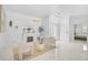 Cozy living room with a fireplace, modern decor, and ample natural light at 4146 Westbourne Cir, Sarasota, FL 34238