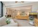 Spacious bedroom with sitting area, flat screen TV and a view of the balcony at 450 Gulf Of Mexico Dr # B207, Longboat Key, FL 34228