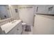 Modern bathroom featuring a walk-in shower and a sleek vanity at 4760 Gulf Of Mexico Dr. Villa 7, Longboat Key, FL 34228