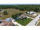 Spacious single-story home with mature landscaping, a pool, and a sprawling lawn at 5209 26Th W Ave, Bradenton, FL 34209