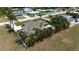 Well-maintained property featuring a swimming pool, lush landscaping and spacious backyard at 5209 26Th W Ave, Bradenton, FL 34209