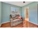Cozy bedroom with a comfortable couch and private bathroom with walk-in shower at 5209 26Th W Ave, Bradenton, FL 34209