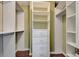 Walk-in closet with built-in shelving and drawers for ample storage space at 5209 26Th W Ave, Bradenton, FL 34209