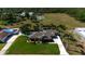 Charming single-story home with a well-manicured lawn, lush landscaping, and an inviting entrance at 5209 26Th W Ave, Bradenton, FL 34209