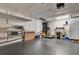 Functional garage space with storage shelves and ample room for vehicles or projects at 5209 26Th W Ave, Bradenton, FL 34209