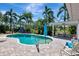 Backyard swimming pool surrounded by lush landscaping and a covered cabana providing a relaxing outdoor retreat at 5209 26Th W Ave, Bradenton, FL 34209