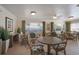 Open dining space is bright with lots of windows and stylish decor at 5300 Gulf Dr # 204, Holmes Beach, FL 34217