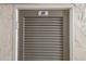Condo front door with the number 57 at 5300 Gulf Dr # 204, Holmes Beach, FL 34217