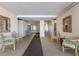 Light and bright hallway with tile flooring, seating areas and decor at 5300 Gulf Dr # 204, Holmes Beach, FL 34217