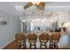 Fully equipped kitchen with stainless steel appliances and a granite countertop bar at 5300 Gulf Dr # 204, Holmes Beach, FL 34217