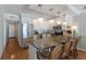 Modern kitchen with stainless steel appliances and an island bar at 5300 Gulf Dr # 204, Holmes Beach, FL 34217