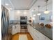 Modern kitchen showcasing stainless steel appliances, countertops, and natural light at 5300 Gulf Dr # 204, Holmes Beach, FL 34217