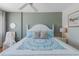 Charming main bedroom with ocean view, ceiling fan, coastal accents, and a tranquil setting for relaxation at 5300 Gulf Dr # 204, Holmes Beach, FL 34217