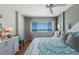 Inviting main bedroom with ocean view, ceiling fan, and a serene ambiance for a restful retreat at 5300 Gulf Dr # 204, Holmes Beach, FL 34217