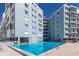 Large, rectangular pool at a condo complex at 5300 Gulf Dr # 204, Holmes Beach, FL 34217