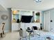 Well-lit living area with a built-in bar and comfortable seating arrangement at 5360 Davini St, Sarasota, FL 34238